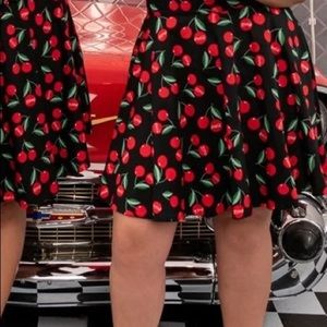 This “Monique” skater skirt is in our bottle cap cherry